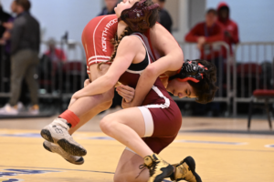 Harrison’s Sienna Cozzali wrestles on Sunday. Cozzali placed sixth at 101 pounds.